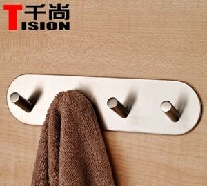 墙上的无痕挂钩怎么取下来